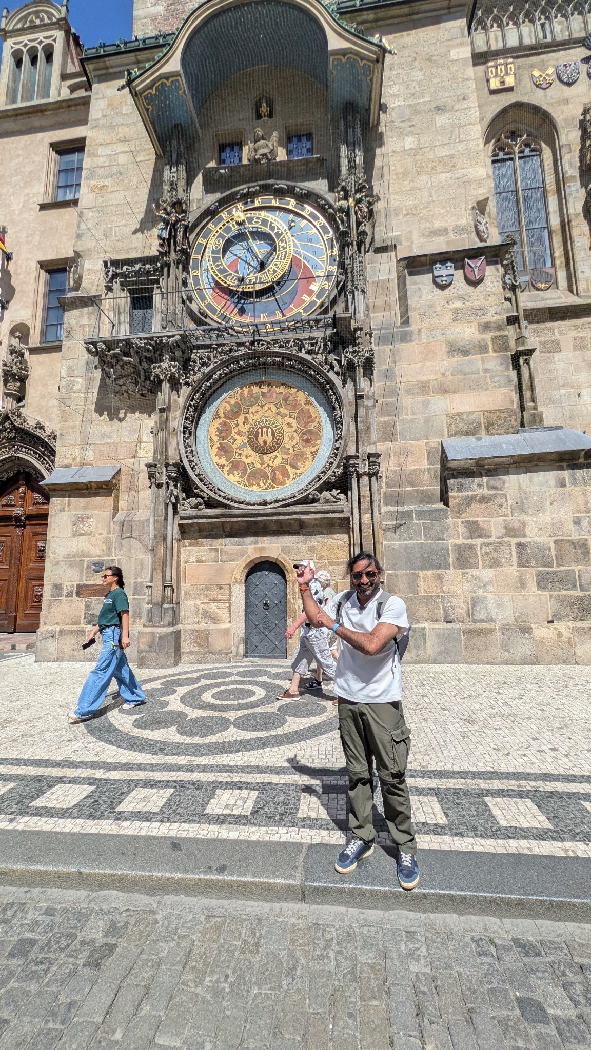 Saki The Wanderer standing in front of Prague Astronomical Clock